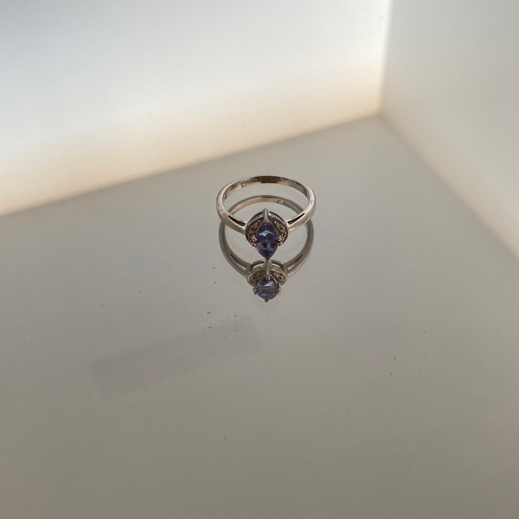 Diamond And Blue Topaz Ring